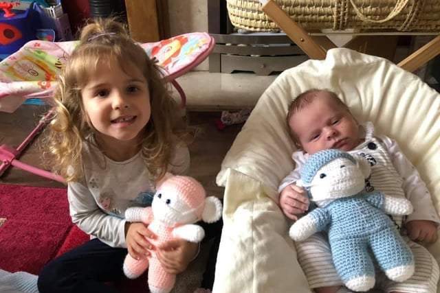 Leanne Fearn says: "The birth of my son, he’s the best thing to come out of this lockdown. Here he is with his big sister holding their NHS teddies."