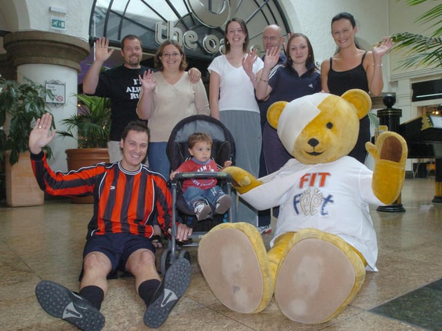 Pictured at the Meadowhall shopping centre, where Theo the Bear and some fit friends of his met up with Elliot Wilson age 18 months and his mum and dad Alistair and Sally to launch the Fit Feet mall walk that will take place Sunday 2nd October to raise cash for the Sheffield Childrens Hospital.