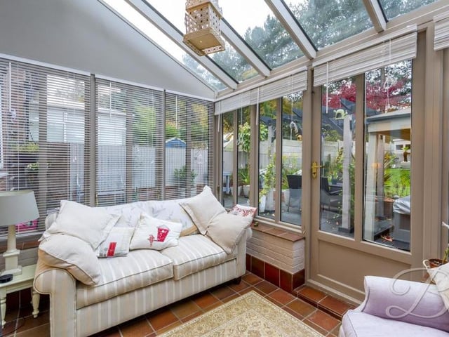 The comfortable conservatory is undoubtedly an asset to the house. Blessed with a central-heating radiator, its windows look out on to the back garden, while a door leads outside.