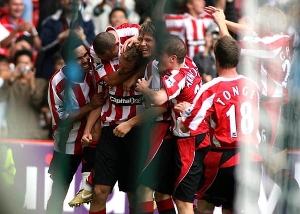 Sheffield United players celebrate Rob Hulse's goal during the Barclays Premiership match against Liverpool at Bramall Lane on August 19, 2006. Photo: Gareth Copley/PA