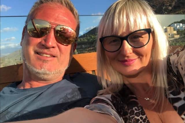 Stephen Bradbury is recovering after suffering brain injuries after being hurt in an incident while he was cycling. He is pictured with wife Donna