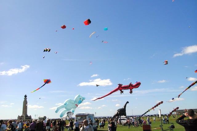 Southsea Kite Festival 30th August 2010. Kites with Ultrasaurus in the background. Picture: Debz Croker