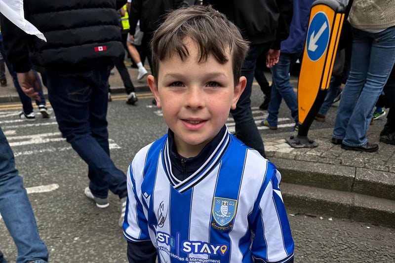 Little seven-year-old George donned a signed Wednesday shirt at the parade.