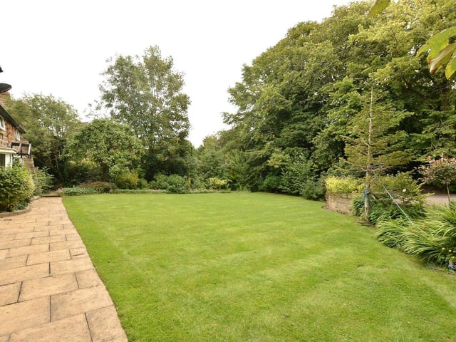 Landscaped gardens surround the property and are fully enclosed, offering complete privacy, and feature borders, shrubs and a paved patio area for alfresco dining.