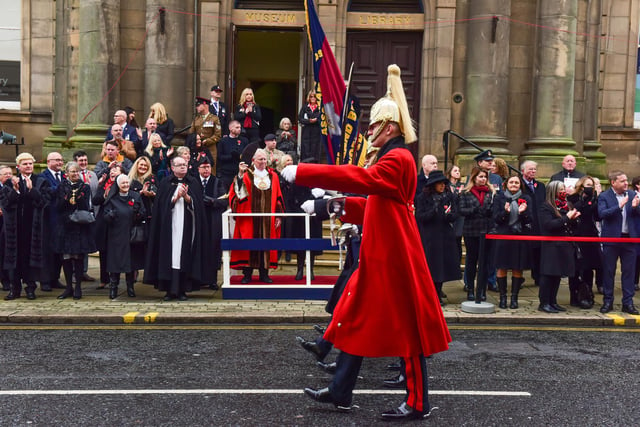 The Mayor of Sunderland, Councillor Harry Trueman, taking the salute.
