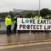 Sheffield's Extinction Rebellion hung a banner that speaks 'the truth' about climate change at the Park Square roundabout this morning.