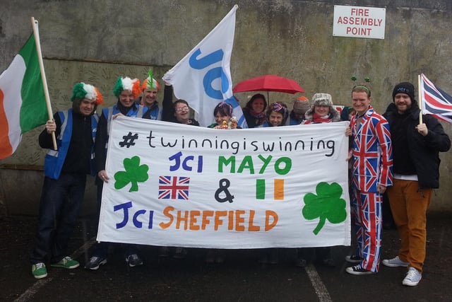 Members of Sheffield's Junior Chamber of Commerce, JCI Sheffield, get ready to mark twinning with their sister chamber in Mayo, Eire by taking part in the Mayo St Patrick's Day Parade in 2013