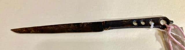 The oldest knife in the Hawley collection, probably dating 1350 -1550, has holes in the handle so it can be worn on a belt