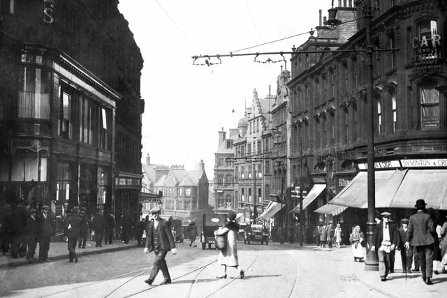 A view looking down Snig Hill and Angel Street, Sheffield, in the early 1900s