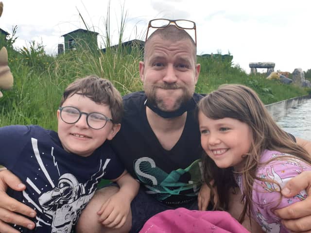 Lee Powell with his son, Sonny, aged 10, and his daughter Ruby, eight, who he said had spotted a girl 'motionless' under the water in the leisure pool at Ponds Forge on Thursday, February 17. He told how he dived down, grabbed the girl and swam with her to the side of the pool where a lifeguard gave her CPR. Thankfully the girl's mother has since said she is 'fine'.