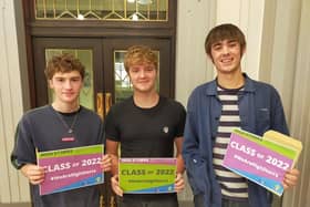 Marcus Williamson (A A* A A*), Luis Dimelow (AAB) and Jacob Boughton-Glerup (A A* A*) open their envelopes to exceptional results.
