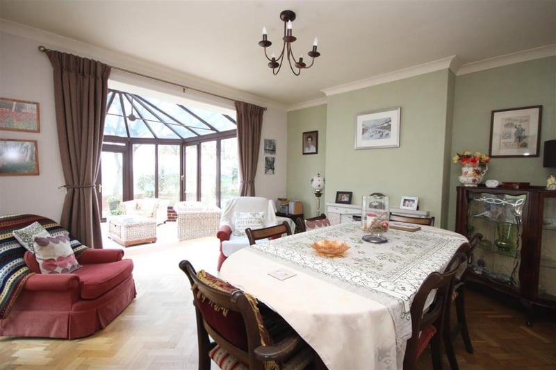 The dining room offers easy access to the conservatory.