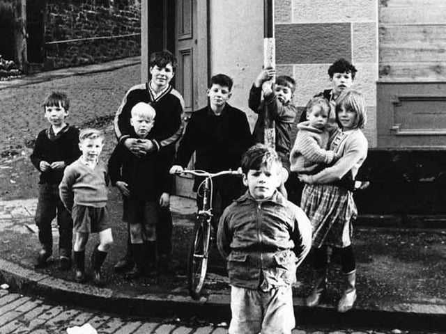 A group of friends on the corner of India Place, 1960s.