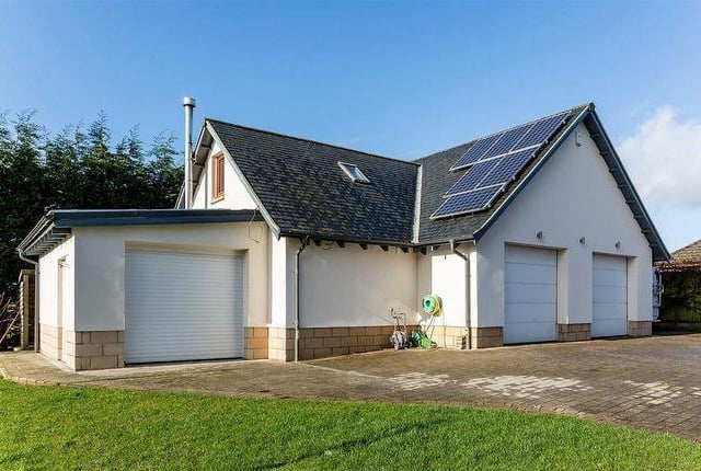 The extensive outbuilding contains a double garage on the ground floor and a spacious upper storey. It is fully serviced and has its own WC.