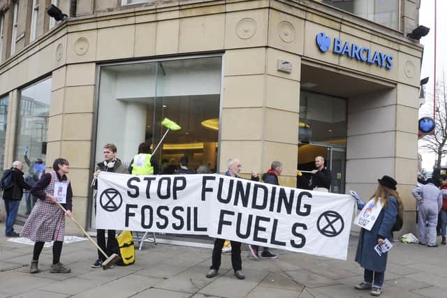 Extinction Rebellion protest outside Barclays Bank on Pinstone Street in Sheffield.