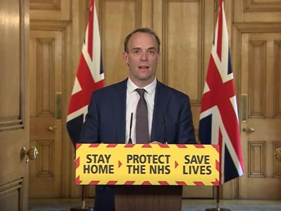 Screen grab of (left to right) Foreign Secretary Dominic Raab during a media briefing in Downing Street, London, on coronavirus (COVID-19).  PA Video/PA Wire