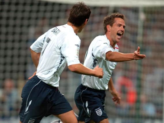 England's Michael Owen (right) celebrates with Gareth Barry after scoring the first goal during the UEFA European Championship Qualifying match at Wembley Stadium. Picture date: Wednesday September 12, 2007.