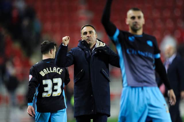 Carlos Carvalhal salutes the fan