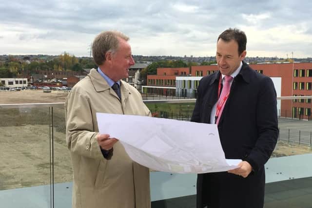 President of Sheffield Chamber of Commerce and Industry Darren Pearce looks over plans for the Olympic Legacy Park with project director David Hobson.