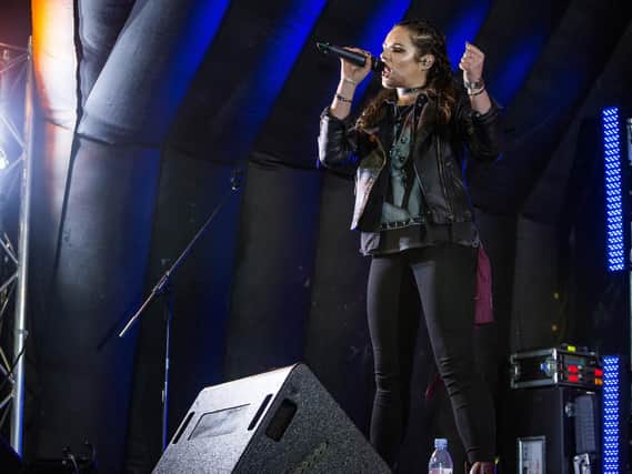 The X Factor's Sam Lavery performing at Barnsley Christmas lights switch on