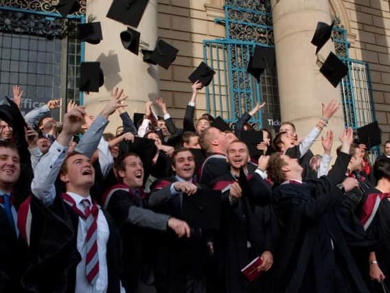 Students from Sheffield Hallam University celebrate their graduation