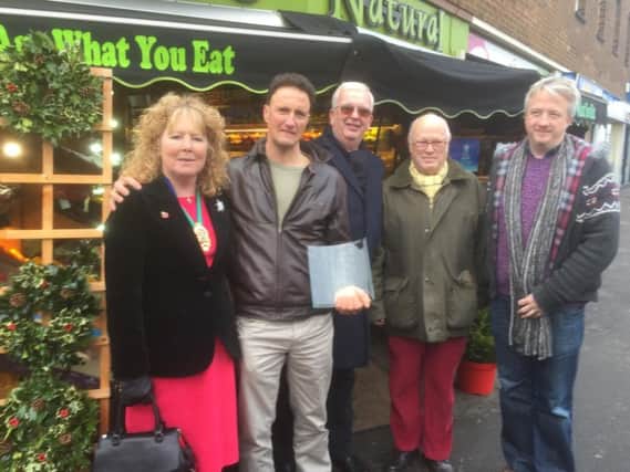 Nigel Burgon (second from left) outside Just Natural with councillors and members of the Federation of Small Businesses
