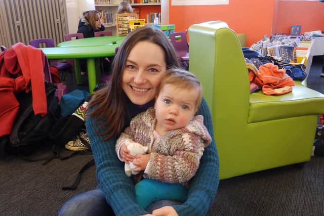 Emily Sheard and her daughter Olive at Highfield Library's baby time session