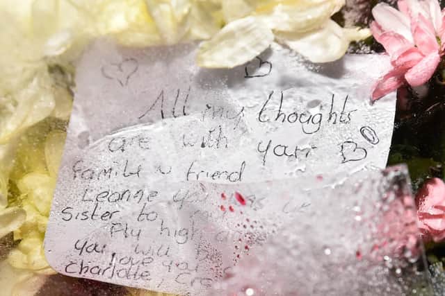 Flowers have been left at the scene, with heartbreaking messages of love for the girl and her family