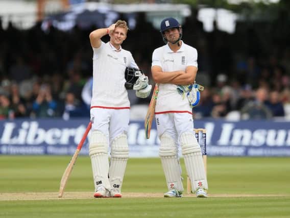 Favourite for the England captaincy role Joe Root and outgoing skipper Alastair Cook. PA Sport