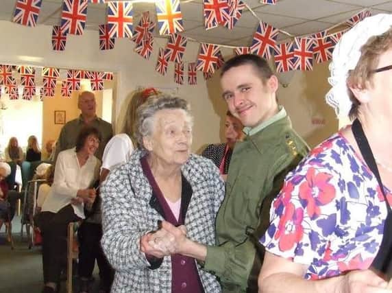 Winnie Daley dancing with Andrew Bramhald at Nightingale Care Home