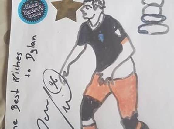 Dylan's picture of Daniel Pudil which the star signed.
