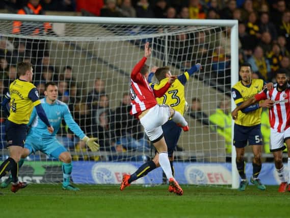 Billy Sharp volleys home the equaliser at Oxford