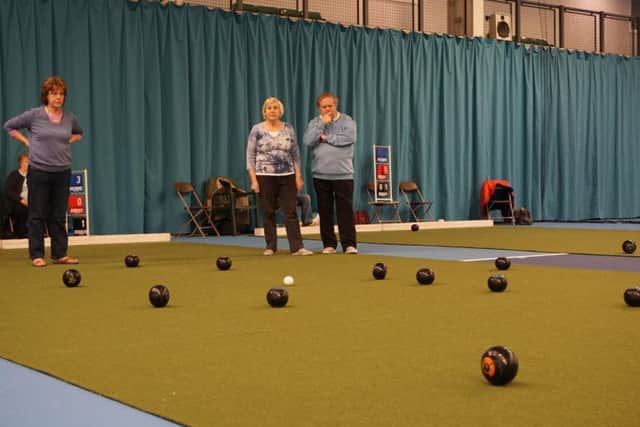 Bowlers play on temporary mats at Graves Health and Sports Centre