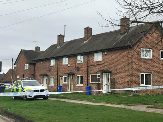 Police officers surrounded a house in Lupton Road, Lowedges, this morning