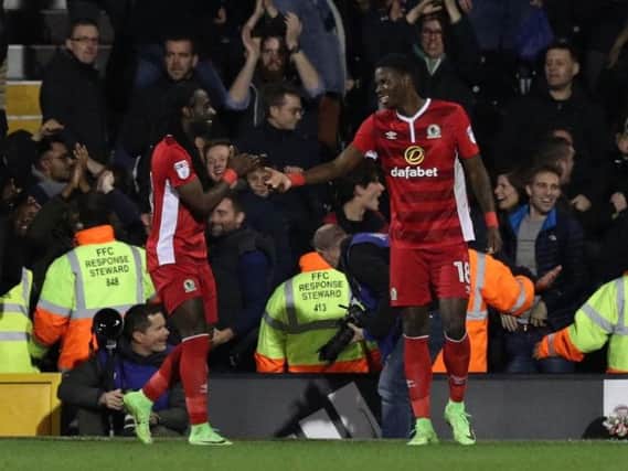 Lucas Joao with Marvin Emnes after scoring a late equaliser for Blackburn Rovers against parent club Sheffield Wednesday's promotion rivals Fulham last night. Picture: PA
