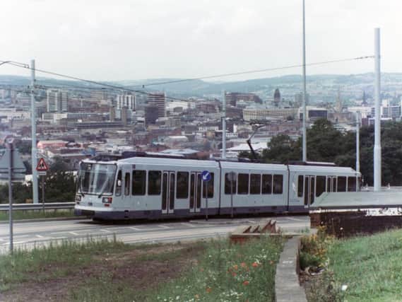 Supertram glides through the city back in 1994.