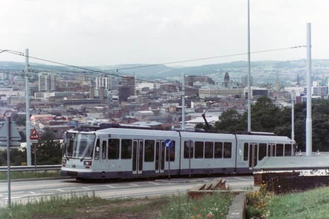 Supertram glides through the city back in 1994.