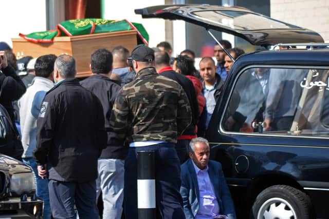 Aseel's coffin is carried into the mosque