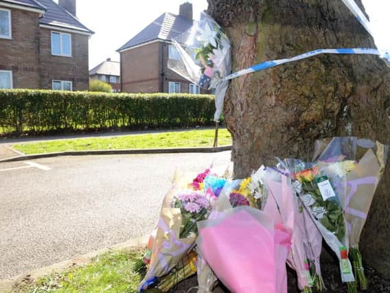 Floral tributes in Southey Avenue