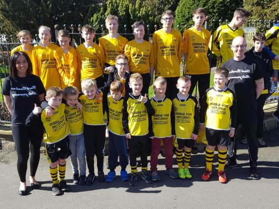 Members of Chapeltown Athletic JFC take part in the sponsored walk
