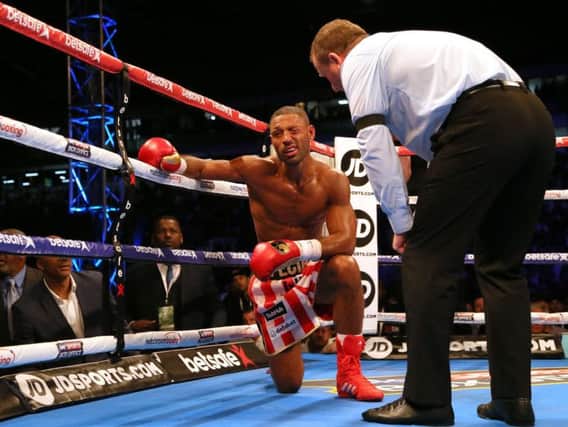 Wincing in pain, Kell Brook bows out against Errol Spence Jr