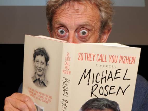 Michael Rosen with his memoir.