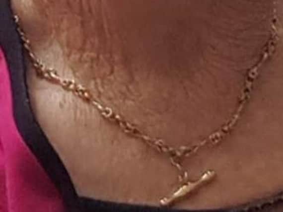 One of the necklaces taken from the 81-year-old's home in Woodhouse, Sheffield