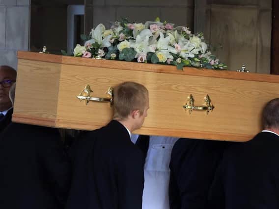 Ruby Gascoigne's coffin is carried into the chapel at City Road Crematorium. Picture: Chris Etchells