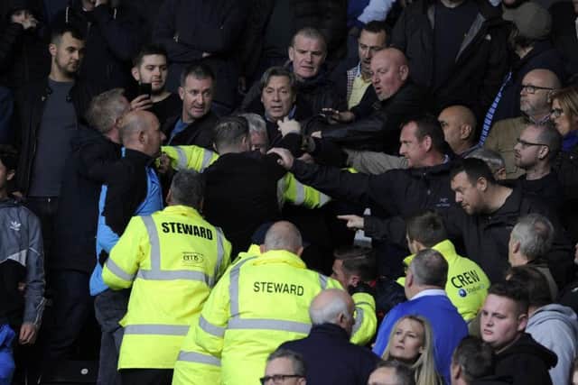 Scuffles break out amongst Sheffield Wednesday fans at Derby