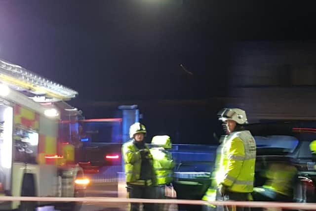 Firefighters at the scene.