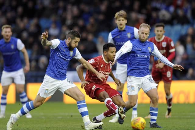 Jacob Butterfield and Barry Bannan in action against Bristol City on Saturday