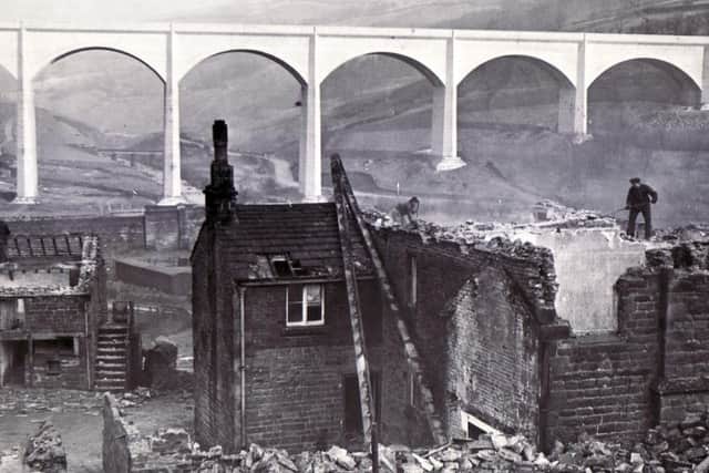 Demolition of the village's buildings gets underway in the early 1940s.