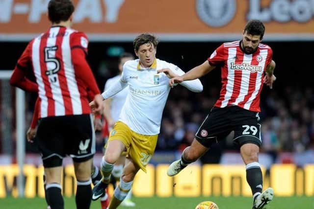 Adam Reach in action for Sheffield Wednesday against Brentford at Griffin Park