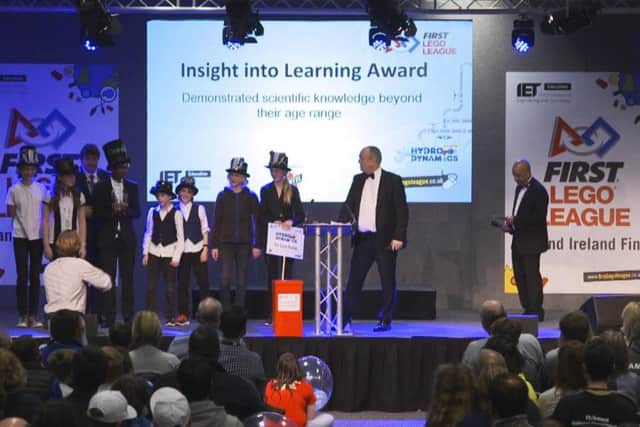 The team collecting the award